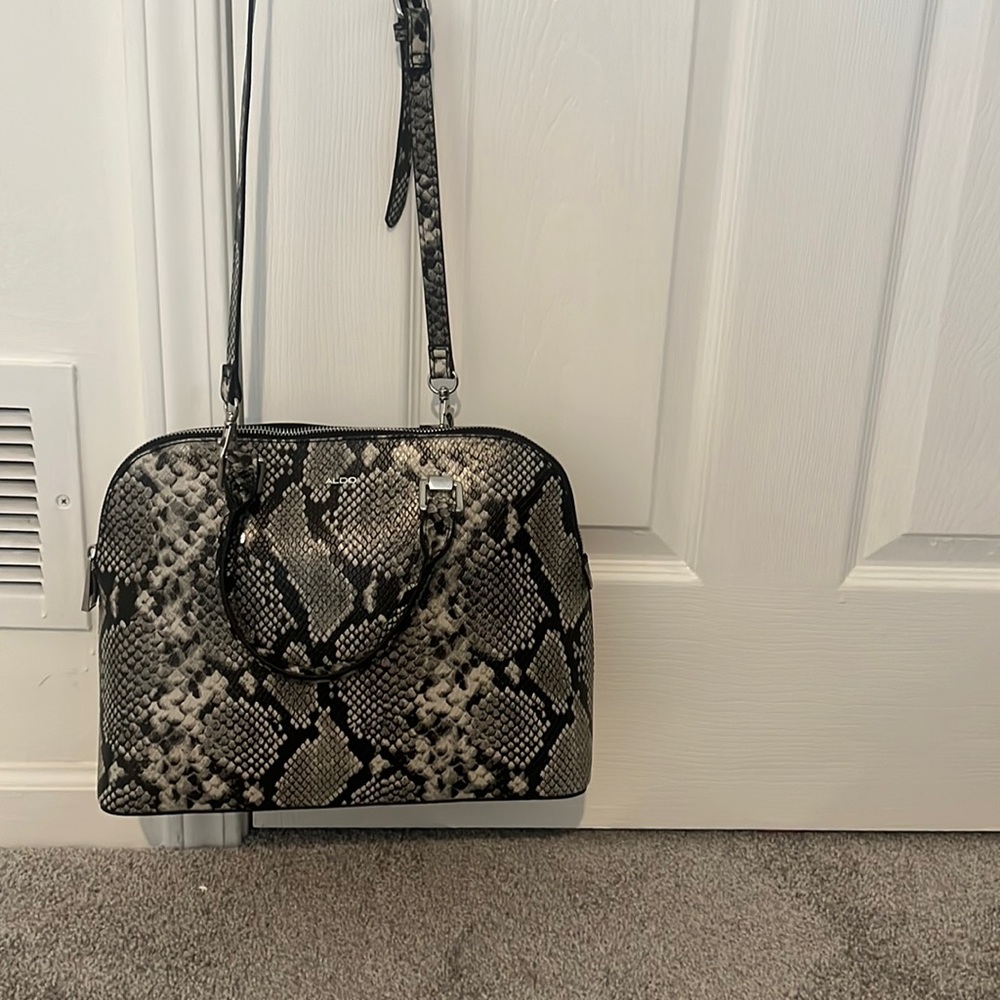 Also, black and white snake bag. New, but without tags.